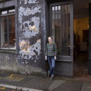 Mia Heath outside her bookbinding business on Queen Street, Dumfries
