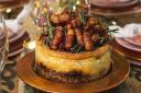 Pigs in blankets on a cheesecake? Image: pleesecakes.com