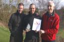 Eddie (centre) with his award flanked by Victor Tarr and assistant green keeper Wayne Atkinson