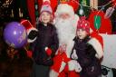 Santa meets sisters, Heather (4) and Lorelai Sanson (2) from Chester