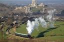 Swanage Railway steam train chuffing past Corfe Castle. Photo by Andrew P M Wright