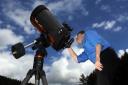 Amateur astronomer Richard Darn scans the skies with a powerful telescope Photo: Tony Bartholomew