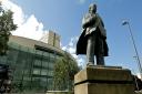 The National Media Museum stands behind the statue of famous son J B Priestley