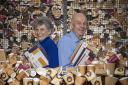 Sarah and Mark Downey, founders of Dorset-based business Epic Print, holding some of their Coffeenotes range of stationery created from recycled paper coffee cups
