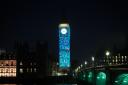 Images are projected onto the Elizabeth Tower in Westminster
