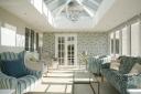 Dragonfly wallpaper is a feature of this conservatory by Jenny Junior Interiors (c) Alison Hammond