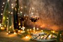You can't have too many fairy lights at Christmas - weave tiny ones round your buffet table GETTY