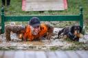 It's a case of mud, sweat and cheers when you take part in the Muddy Dog Das at Upton Park in Poole.