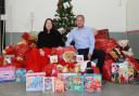 Dee and Chris Drake with a selection of toys for the appeal. PHOTO:Kirsty Thompson