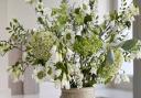 The Faux Wild Flower Arrangement creates an effortlessly fresh and clean look for any space.