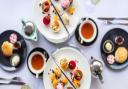 A modern high tea featuring sweet and savoury finger food