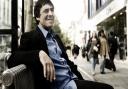 Mark Steel surreptitiously checking out another high street for his BBC Radio 4 series In Town (Photo by Idil Sukan)
