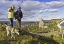 Couple walking dog on Coast Path with Llanbadrig church and North Anglesey coast behind
Near Cemaes
Anglesey
North
Walking
Activities and Sports