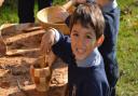 Children from Northbourne Park School make mud pies