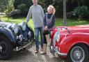 Brian Dodd and wife, Veronica, and their converted 1947 MKIV 3.5 ltr Jaguar (black) and 4.2ltr XK120 (red)