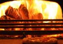 A pizza nestles in the wood-fired oven at Eric's Pizza at Drove Orchards, near Hunstanton  Picture: Chris Bishop
