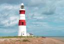 Orfordness Lighthouse stood on Orfordness for more than two centuries. Now it has been demolished as the tide eroded the shingle spit beneath it. Image: Getty Images