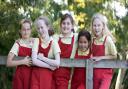 Some of the Knighton House pupils in their practical and distinctive red dungarees