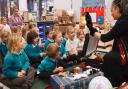 Pupils from Merlin Top Primary in Keighley are entranced by storyteller Sita Brand