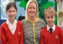New head of Hipperholme Junior School Sarah Weller with pupils Luchia Shaw and William Bentley