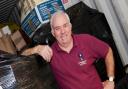 Award-winning teacher Barry Brindley loads a container for Malawi