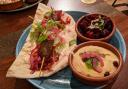 Lamb kofta with sides of roast beetroot and humous from Souk at Yalm
