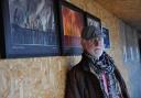 Terry Bryan inside one of the Minsmere hides where his work is on display.