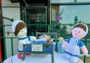 Hospital-themed postbox topper created by West Yorkshire knitting group Knit and Natter
