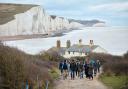 Pass by the iconic Coastguard Cottages on Walk the Chalk. Alex Franklin