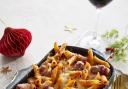Cheesy penne pasta and spicy pigs in blankets