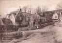 The Row circa 1910 showing Tyneham Post Office with the church beyond. (Photo: Barry Cuff Collection/The Dovecote Press)