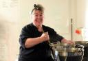 Candi Robertson creating her chutneys and sauces for her business, Candi's Cupboard.
