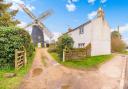 Bardwell Windmill is for sale with a cottage, flint barn and workshop.