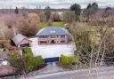 A contemporary double fronted property set in over two acres of grounds