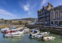 Boats moored in the lovely little square inner harbour at Dartmouth