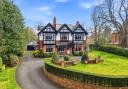 Period house with patterned brickwork, timber detailing and driveway