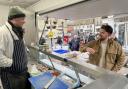 James buying fish from Dave Bunning.