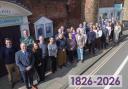 The Chichester team outside the firm’s head office in Baffins Lane