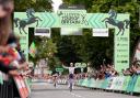 Lewis Askey celebrates winning stage one of the 2026 Lloyds Tour of Britain in Lincoln