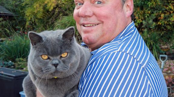 Great British Life: Ted with his cat 'Annie' at home in Crawshawbooth Great British Life: Ted with his cat 'Annie' at home in Crawshawbooth
