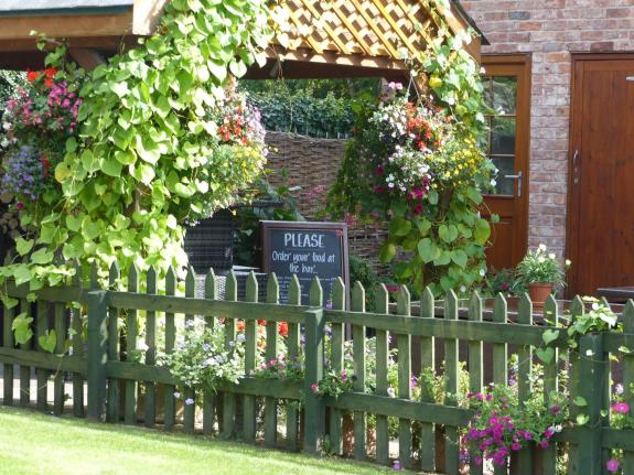 Great British Life: The pretty beer garden at the Badger Inn. Great British Life: The pretty beer garden at the Badger Inn.