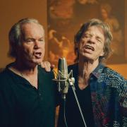 Chris is close to his brother Mick Jagger