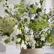 The Faux Wild Flower Arrangement creates an effortlessly fresh and clean look for any space.