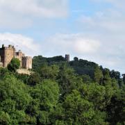 Dunster castle rises above the landscape, for 600 years the home of the Luttrell family and now in the care of the National Trust. Conygar Tower stands nearby