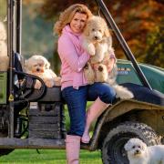 Broadcaster Natasha Kaplinsky and her five dogs at her Sussex home near Haywards Heath (L-R: Doodle, Dot, Scribble, Natasha, Teddy and Molly).