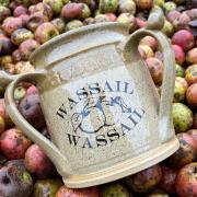 The Hornblotton wassail cup, with apples ready to go to the press
