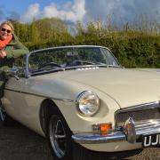 Fernwith the vintage MGB that she drives in the series