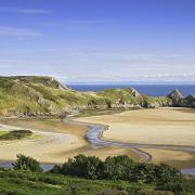 'Blue Flag' certified, award-winning Three Cliffs Bay is renowned for its sandy beaches.