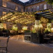 The luxurious Norton Courtyard at Grantley Hall sparkles at night