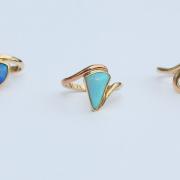 Three opal rings